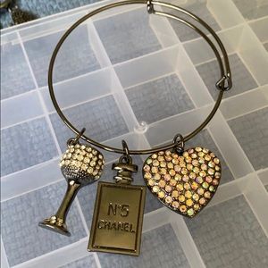 Black bangle with charms